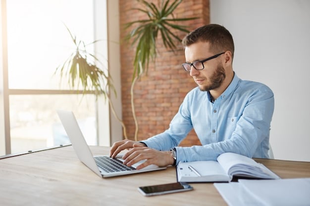 Focused Professional Working At A Desk